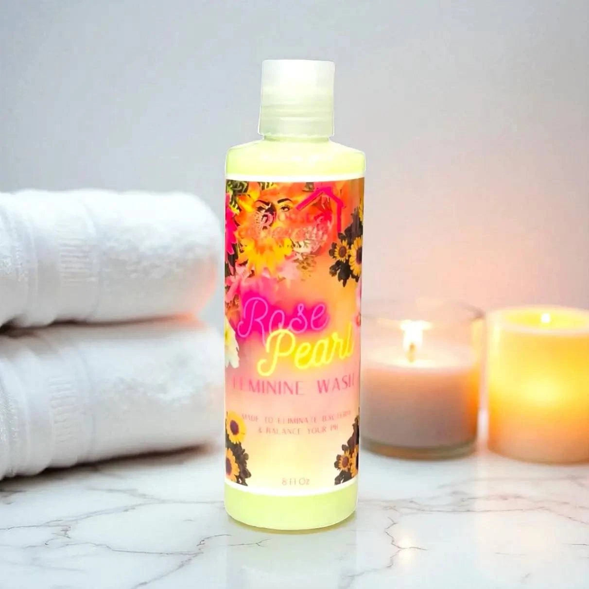 Rose Pearl feminine body wash by House Of Beauty by Paris J, with a soft pink bottle and floral label design.