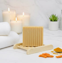 Load image into Gallery viewer, House of Beauty by Paris J turmeric and honey skin care bar with natural ingredients and a soothing, golden-colored soap bar.